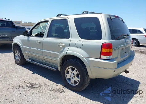 2004 Ford Escape Limited z USA, uszkodzony, nr VIN 1FMCU04174KA97935